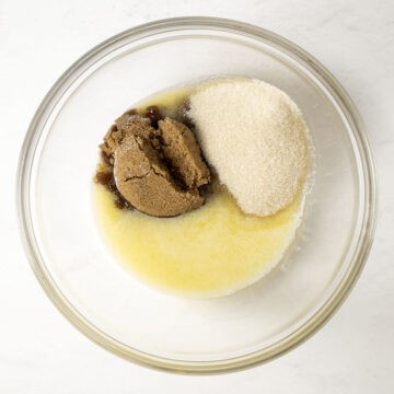 Butter and sugar in a bowl.