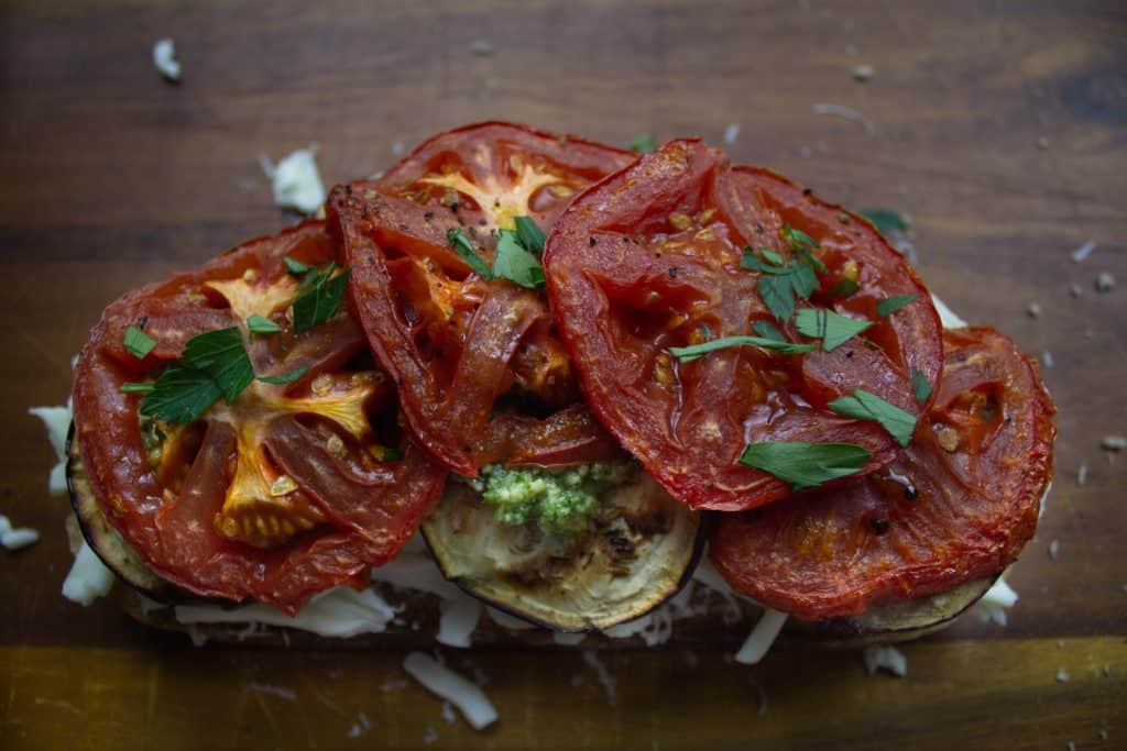 Grilled cheese with eggplant and roasted tomatoes before frying
