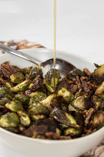 maple syrup poured on cooked brussel sprouts