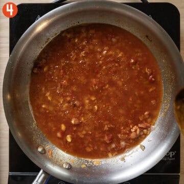 Deglazing pan with vodka.