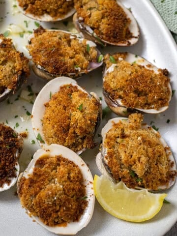 Baked clams on a plate.