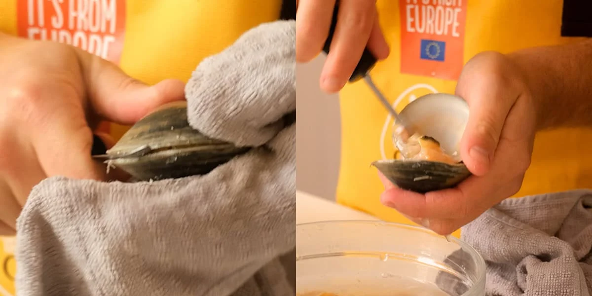Vinny shucking clams with a knife.