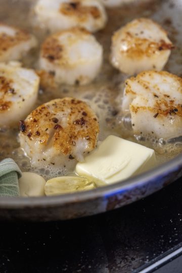 basting scallops in butter with sage and garlic
