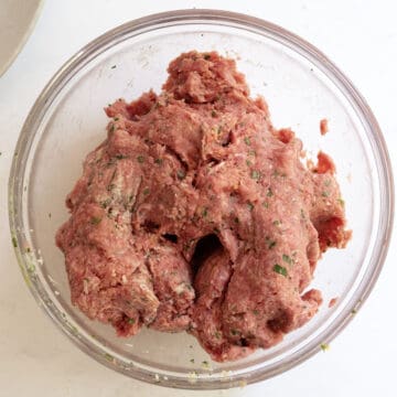Meatball mixture combined in a bowl.
