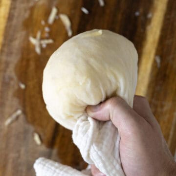 Drying potatoes in cheese cloth.