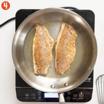 Snapper flipped over to sear other side.