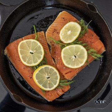 searing salmon in the cast iron skin side down