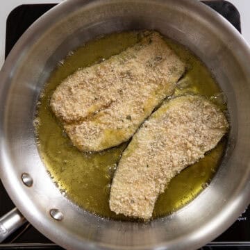 Frying eggplant in a saucepan.