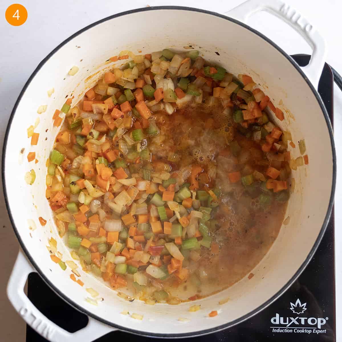 Deglazing pan with white wine.