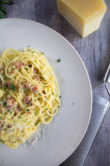 Carbonara with cheese pilling into little balls.