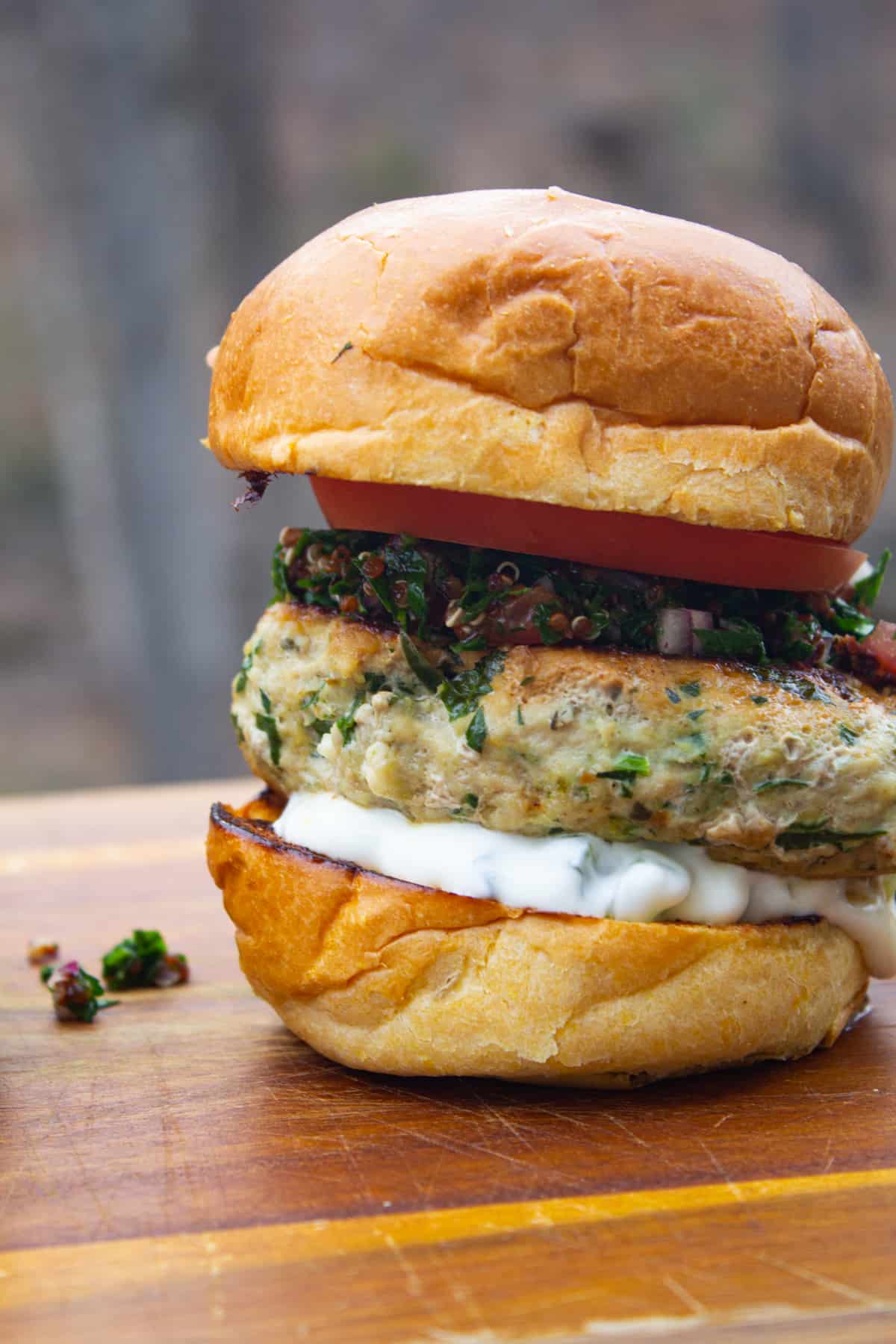 greek chicken burger with tzatziki and tabbouleh