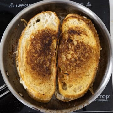Fried grilled cheese in frying pan.