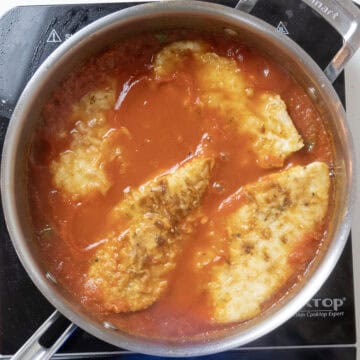 Chicken added to the sauce.
