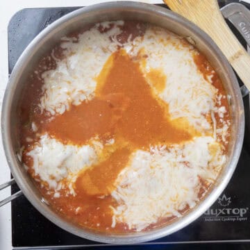Chicken topped with mozzarella.