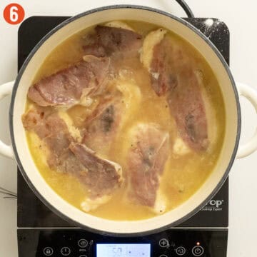 Finishing the chicken in the lemon white wine sauce.