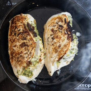 Chicken breast seared on the cast iron.
