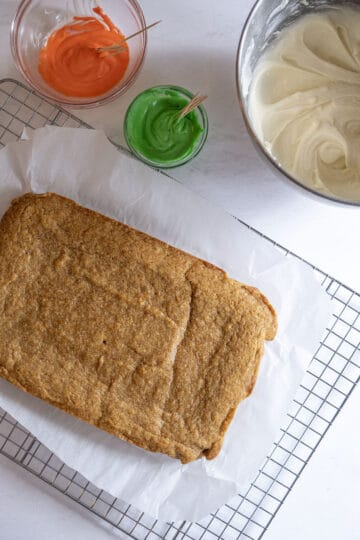 blondies with cream cheese frosting on side