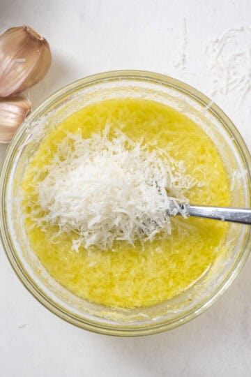 Added pecorino to lemon juice in a bowl.