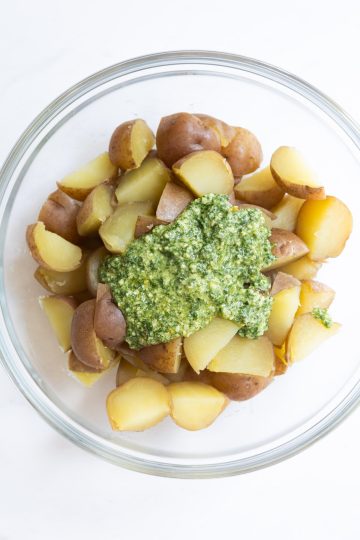pesto added to red potatoes