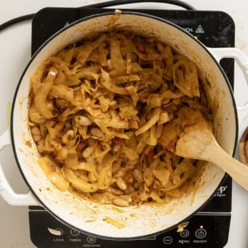 Braised cabbage with beans and pancetta.