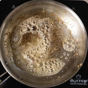 butter added to frying pan for eggs.