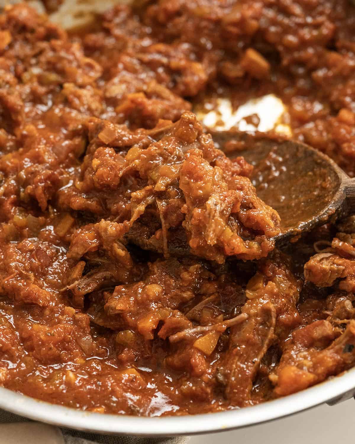 Braised Italian short ribs in a pan.