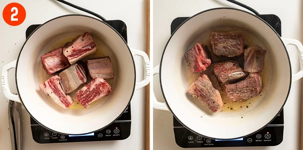 Searing short ribs until golden brown.