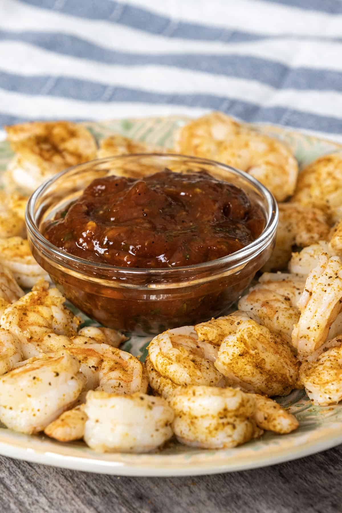 homemade shrimp cocktail with cocktail sauce and seasoning