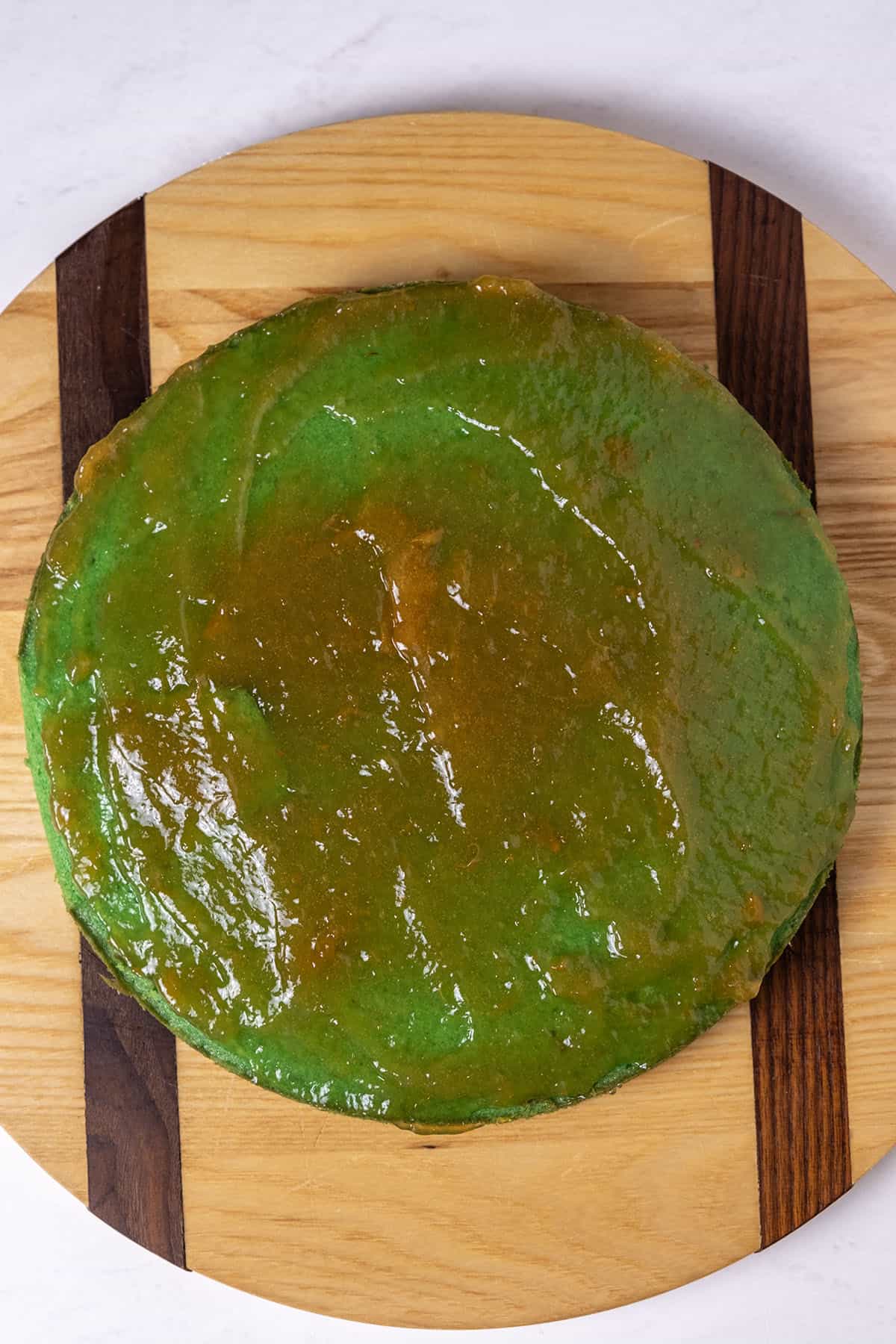 apricot jam spread on first layer