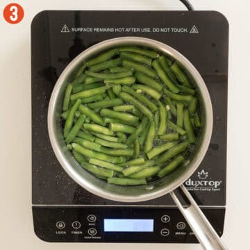 Boiling green beans.