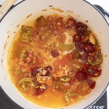wine, hot cherry pepper juice and cherry peppers added