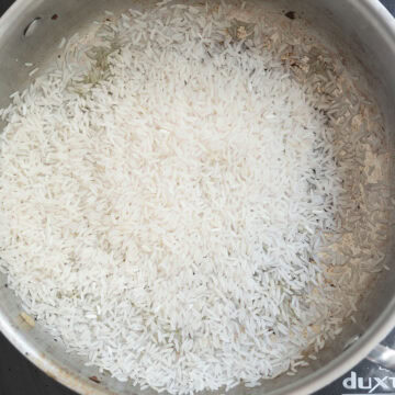Rice toasting in pan.
