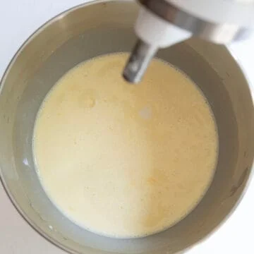 Heavy cream and milk whisked into the eggs in a kitchen aid mixer.