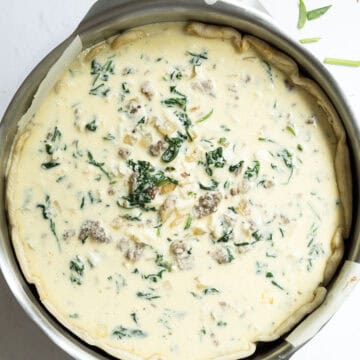 egg mixture added to the pie crust in the pan.