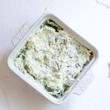 Cheese mixture in an oven safe dish.
