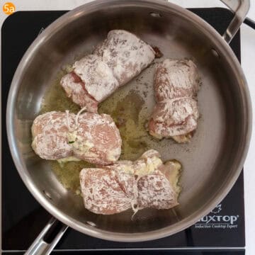 Frying the chicken rollatini in a pan.