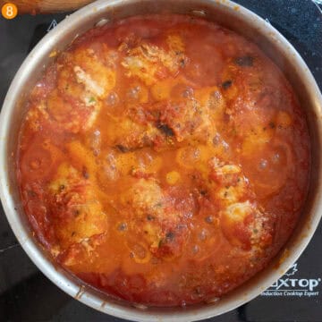 Chicken rollatini simmered in the sauce.