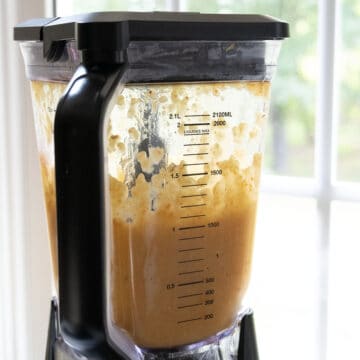 Half of the soup blended in the blender.