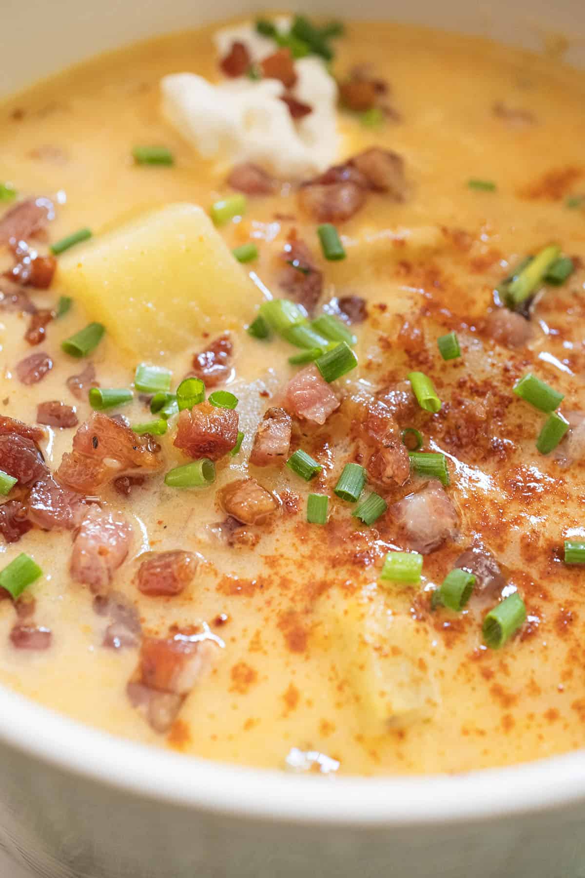 Creamy potato and onion soup topped with pancetta, chives, and sour cream.