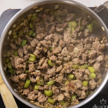 Browning sausage with vegetables.