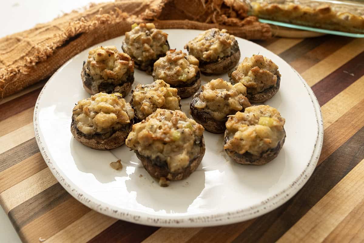 Italian sausage stuffed mushrooms on a plate.