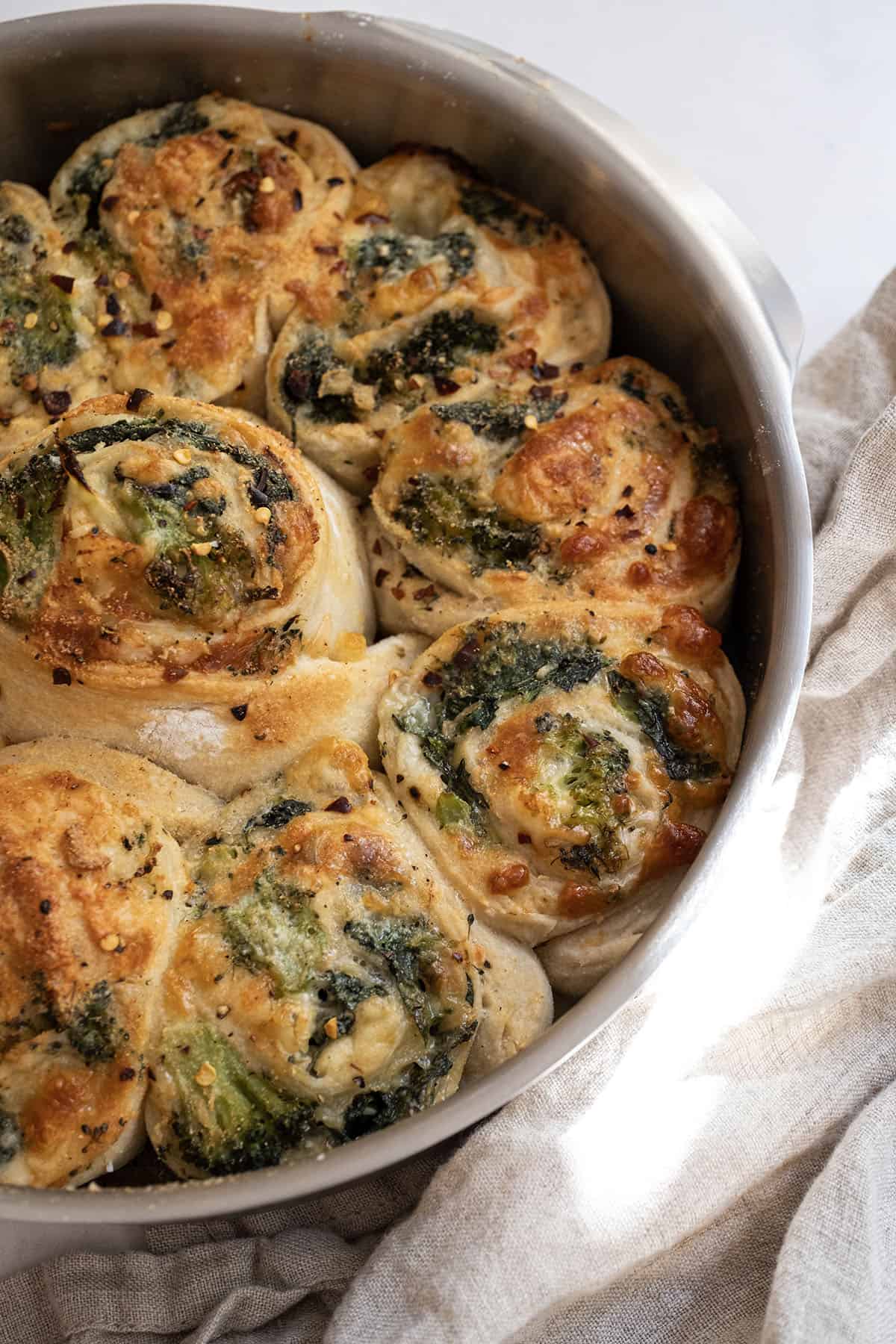 Veggie pinwheels baked in a cake pan.