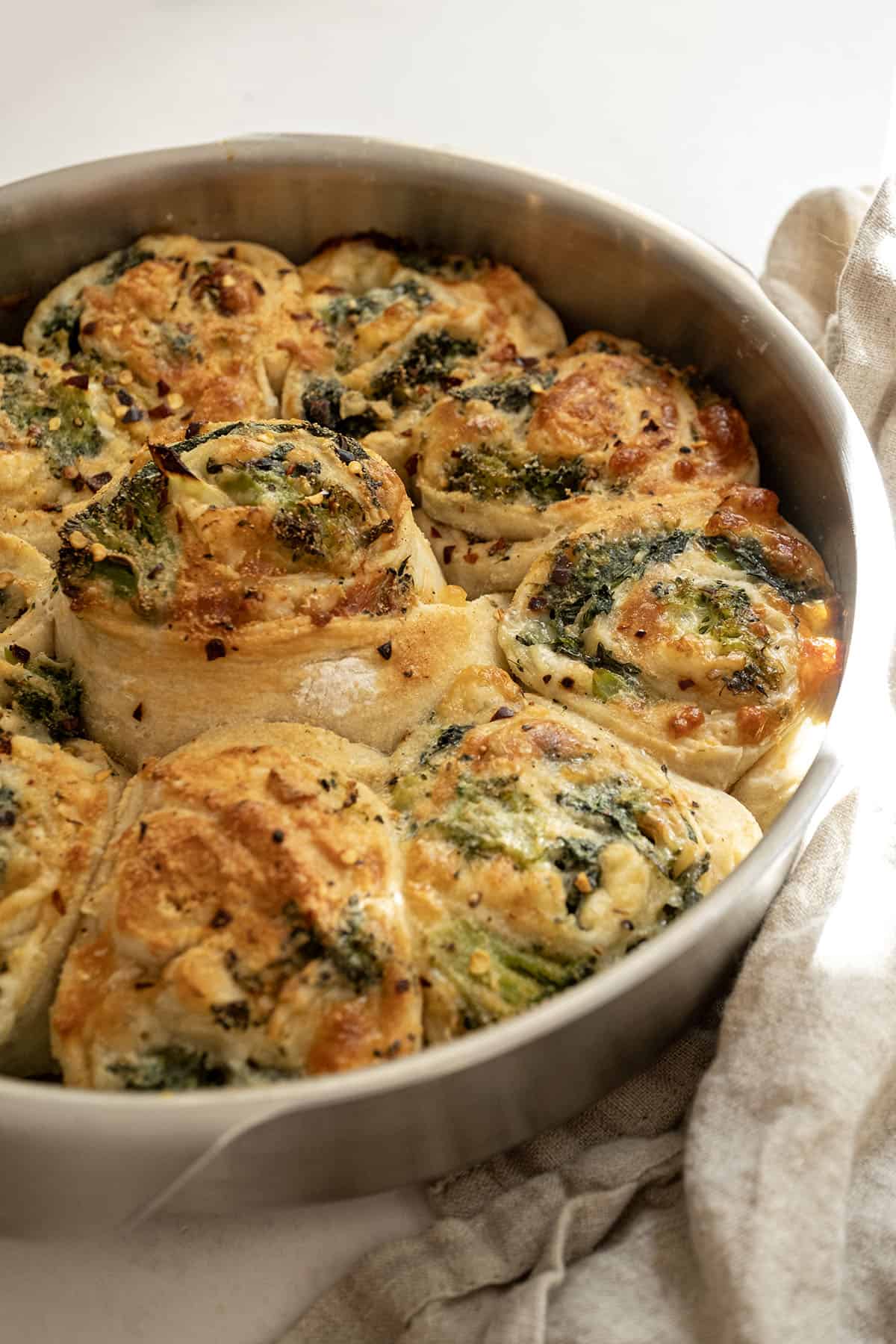 Veggie pinwheels baked in a cake pan.