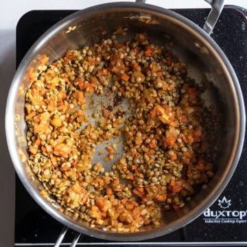 Dry lentils added to sauce pan and combined.