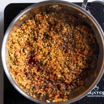 Red wine simmering with lentils.