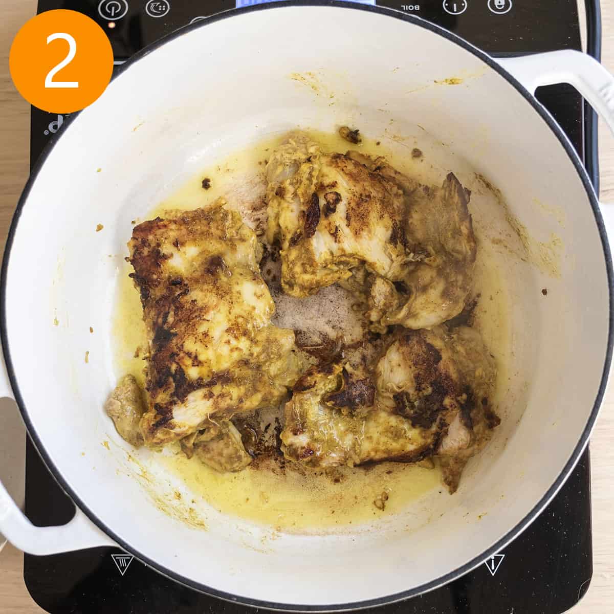 Searing chicken thighs in dutch oven.