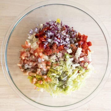 Combined vegetables and meat for the salad.