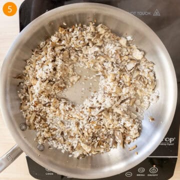 Deglazing pan with white wine.