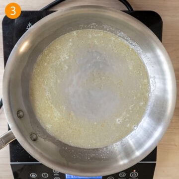 Combining pasta water with butter.