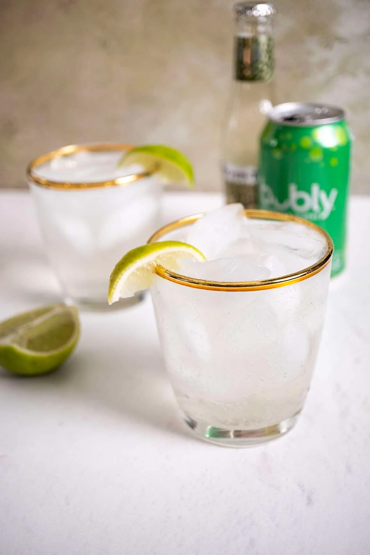 2 glasses of non alcoholic mules with a lime and can of seltzer.